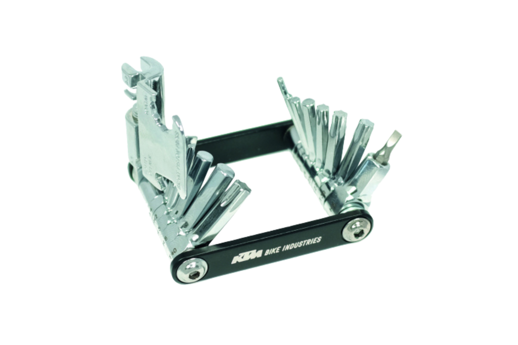 Aufgeklapptes KTM Mini Tool Pro 22 Fahrrad-Multitool mit silbernen Werkzeugen und schwarzem Rahmen auf weißem Hintergrund